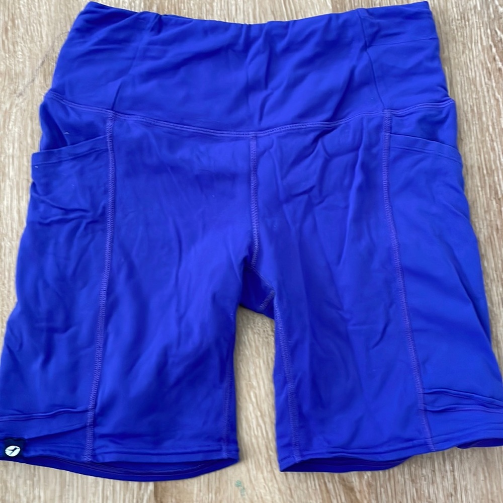 Oiselle blue bike shirts with pockets